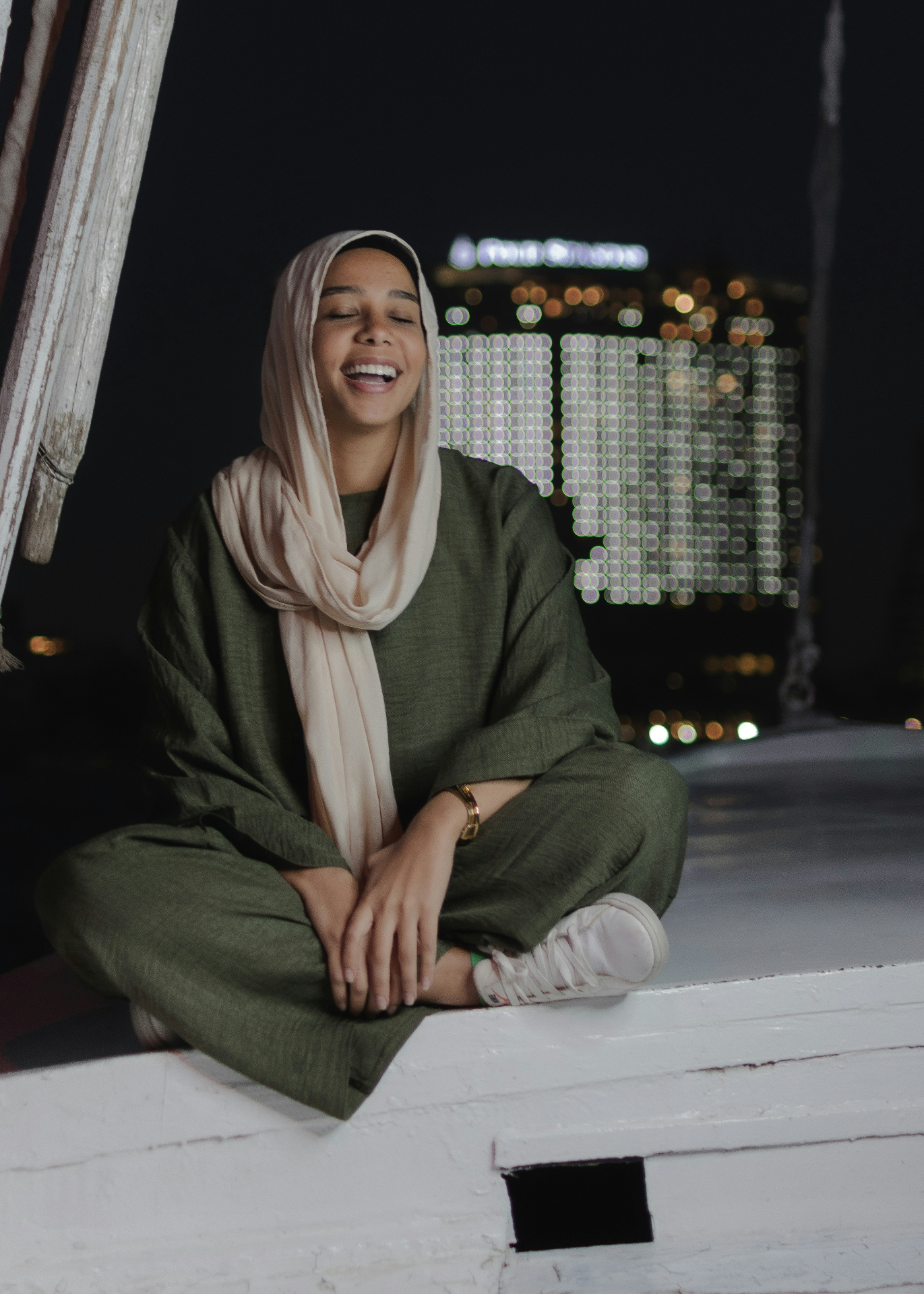 Laughter, on a felucca by night